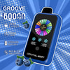 Dispositivo elettronico per vaping blu e nero chiamato 'Crystal Mary' con schermo digitale, circondato da mirtilli, e testo promozionale che evidenzia 50000 puff, 28 ml di liquido, doppia coil, batteria da 900 mAh e livelli regolabili di nicotina e ghiaccio.