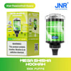 Confezione e dispositivo per narghilè Jnr Mega Shisha per il gusto kiwi, frutto della passione e guava, con design a tema verde, contatore digitale delle boccate e un'etichetta di avvertenza sulla dipendenza da nicotina.
