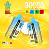 Bang King Disposable Vape Devices In Blue And Yellow With A Monkey Logo, Displayed Against A Bright Yellow Background, Highlighting Features Such As 30,000 Puffs, Type-C Charging, 550Mah Battery, And 36Ml Capacity, With Flavors Blueberry Ice And Strawberry Banana Shown At The Bottom.
