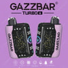Two Gazzbar Turbo Disposable Vape Devices With A Purple And Black Cosmic Star Design And Constellation Graphics, Displayed Against A Purple Background With Product Branding And Icons.
