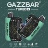 Two Gazzbar Turbo Vape Devices With Green Sides And A Starry Constellation Design On A Dark Background, Featuring Branding And Product Icons For Features Like Dual Mesh Coil, 5% Nicotine, And Quick Charge.