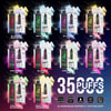 Product Display Of Twelve Stagbar Disposable Vape Devices In Various Flavors, Each Pictured With Its Packaging, Against A Colorful Paint Splash Background With Large Text Promoting 35,000 Puffs And Eu Warehouse Shipping.