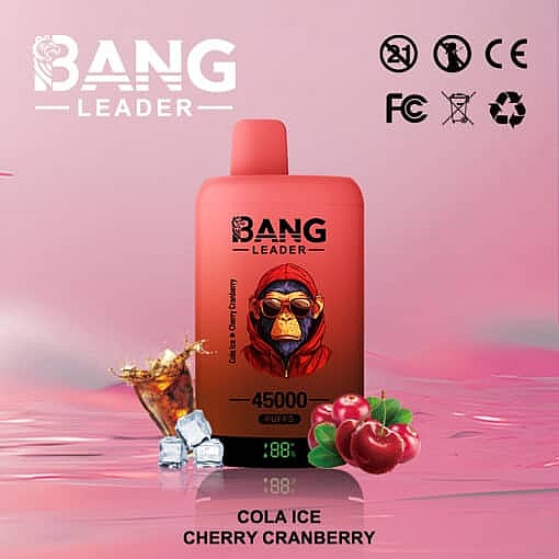 Bang Leader Vape Device With A Red Design Featuring A Gorilla Graphic, Advertised With Cola Ice And Cherry Cranberry Flavors, Surrounded By A Glass Of Cola With Ice Cubes And Fresh Cherries On A Pink Background.