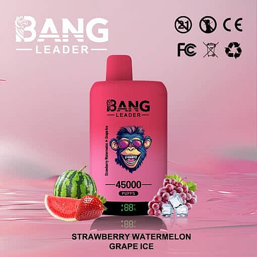Pink Bang Leader Disposable Vape Device Featuring A Cartoon Monkey Logo, Surrounded By Strawberries, Watermelon, Grapes, And Ice Cubes, With Text Indicating 45,000 Puffs And The Flavors Strawberry Watermelon Grape Ice.