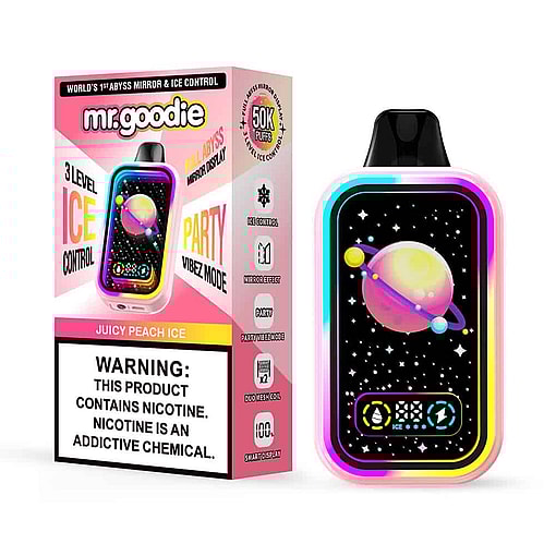 Colorful Mr. Goodie Vape Packaging And Device Labeled 'Juicy Peach Ice,' Featuring A Digital Display With A Cartoon Planet Design And A Prominent Nicotine Warning On The Box.