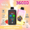 ストロベリーバナナ味のA Bang使い捨てベイプデバイスのプロモーション画像。デジタルディスプレイ機能付きのカラフルなベイプユニット、デバイスの仕様、スケートボーダーのキャラクターのイラストに加え、デュアルメッシュ、アイスチューニング、デュアルオイルタンク、指紋圧力調整、850Mahバッテリー、Type-C充電を強調するアイコンが表示されています。