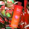 Promotionele afbeelding voor de Bang King Triple Disposable Vape, met een rood-oranje apparaat met een wolvenafbeelding, de tekst 'Winter is kwamen' en claims van 45.000 trekjes, omgeven door kleurrijke fruitontwerpen en details over zijn tropische fruit, aardbeienwatermeloen en citroenpereach-smaken.
