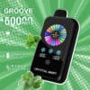 Crystal Mary Groove Vape-apparaat met digitaal display, omgeven door muntblaadjes en tekstmarkering, 50.000 trekjes, 28 ml e-liquid, dual-core, 900 mAh-batterij en instelbare nicotine- en ijsinstellingen op een groene achtergrond.