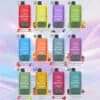 Twelve Colorful Disposable Vape Devices Labeled '5000 Twins Fizzy,' Each With Names And Images Of Different Fruit Flavors, Arranged In A Grid Against A Pastel Gradient Background.