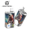 Twee metalen kristallen Twin 50K vape -apparaten met een kleurrijke astronaut illustratie en digitaal display, met branding- en smaakdetails op de verpakking.