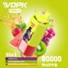 Kleurrijk Vopk Triple Vape-apparaat met een tekenfilmfiguur, omringd door fruitsoorten die de smaken Grape Ice, Strawberry Kiwi en Watermelon Red Bull voorstellen, met tekst die 3-in-1-smaken en 60.000 trekjes benadrukt.