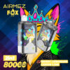 Promotionele afbeelding voor Airmez Fox Vape met twee vape-apparaten met kleurrijke vosillustraties, met de Flavours Berry Lemonade en Lemon Lime, gelabeld als 2-in-1 met 8000 puffs.