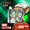 Promotionele afbeelding voor Airmez Fox vapenapparaat met twee apparaten met een cartoonvos in een witte beanie en rood shirt, naast productdetails zoals '2in1', '8000 puffs' en smaken 'tropisch fruit' en 'Love 66'.