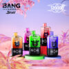 Five Colorful Bang Leader Vape Devices With Illustrated Animal Faces Are Displayed On Round Platforms In A Pastel Fantasy Landscape, With Brand Logos And '120000' Written Above.