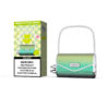 A Vaprivée Vape Device With A Shiny Green And Silver Purse-Like Design And Chain Handle Is Shown Next To Its Product Packaging Labeled 'Double Mango' With A Nicotine Addiction Warning Label.
